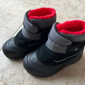 The north face snow shoes red fur trim